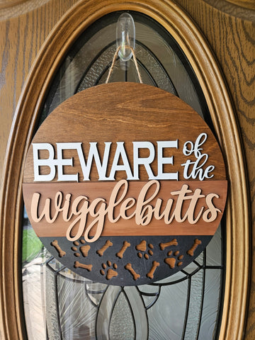 Beware of the Wigglebutts Welcome Sign
