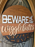 Beware of the Wigglebutts Welcome Sign